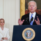 Soccer star and Olympic gold medalist Megan Rapinoe is recognized by President Joe Biden during a ceremony to award the nation’s highest civilian honor, the Presidential Medal of Freedom, in the East Room of the White House in Washington, Thursday, July 7, 2022.